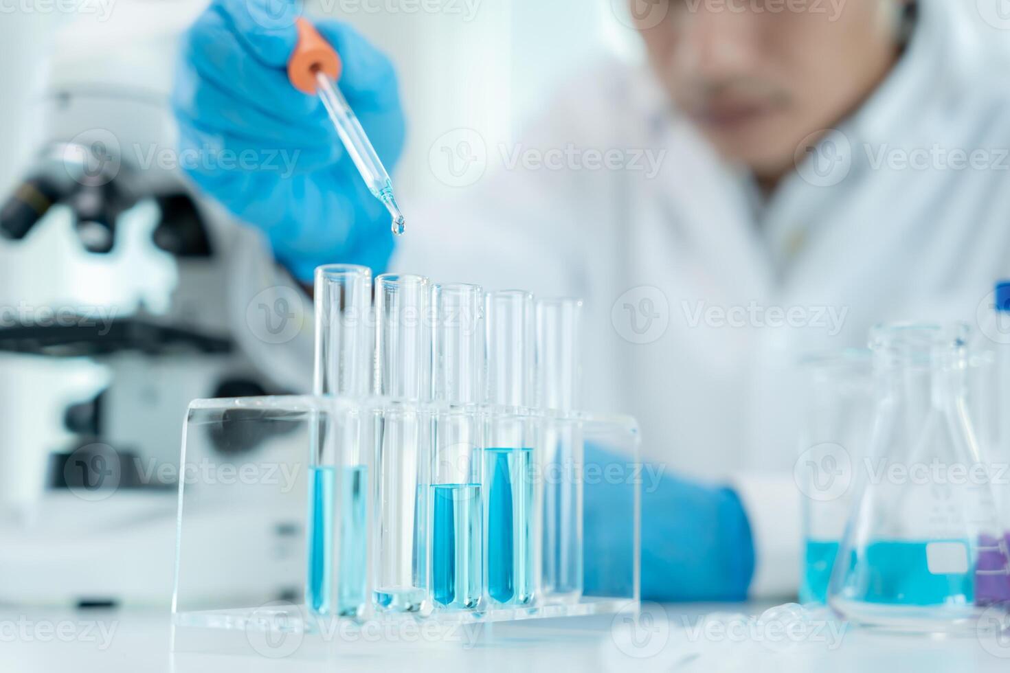 Scientist analyze biochemical samples in advanced scientific laboratory. Medical professional use dropper mix microbiological developmental of viral. Biotechnology research in science lab. cosmetic photo