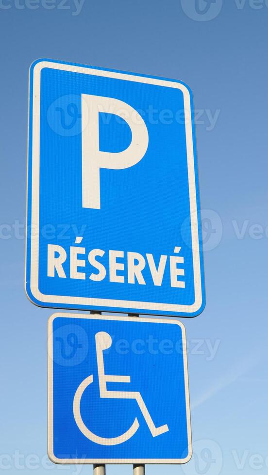 A blue and white sign photo