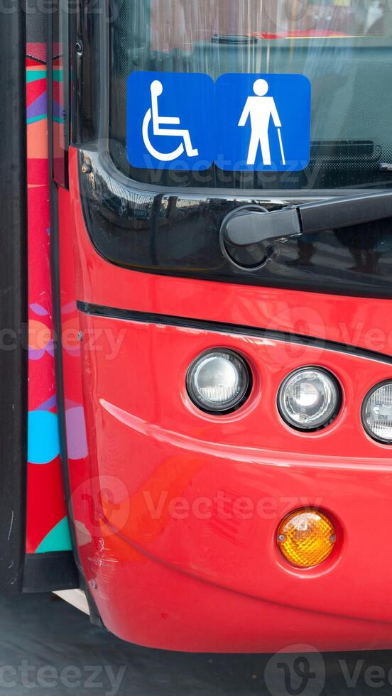 A red bus with a sign on the front photo