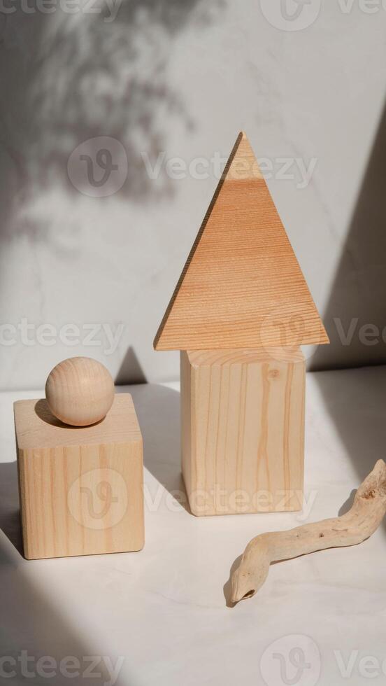 Wooden toys with a wooden house and a wooden egg photo