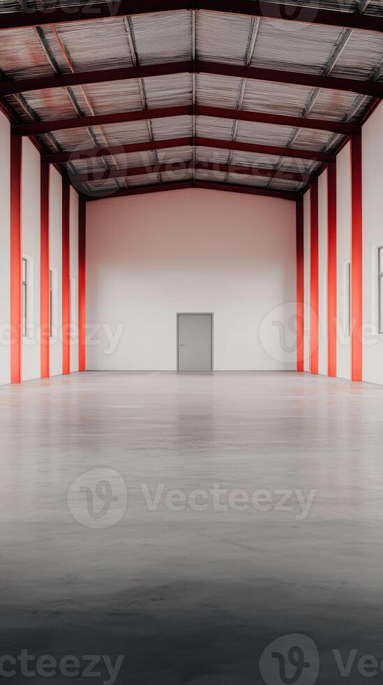 A spacious industrial warehouse with high ceilings and red pillars on a polished floor. photo
