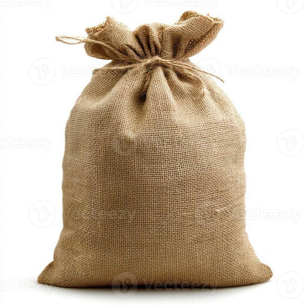 A rustic burlap sack tied at the top, ideal for storage, decoration, or showcasing natural materials in a cozy environment. photo