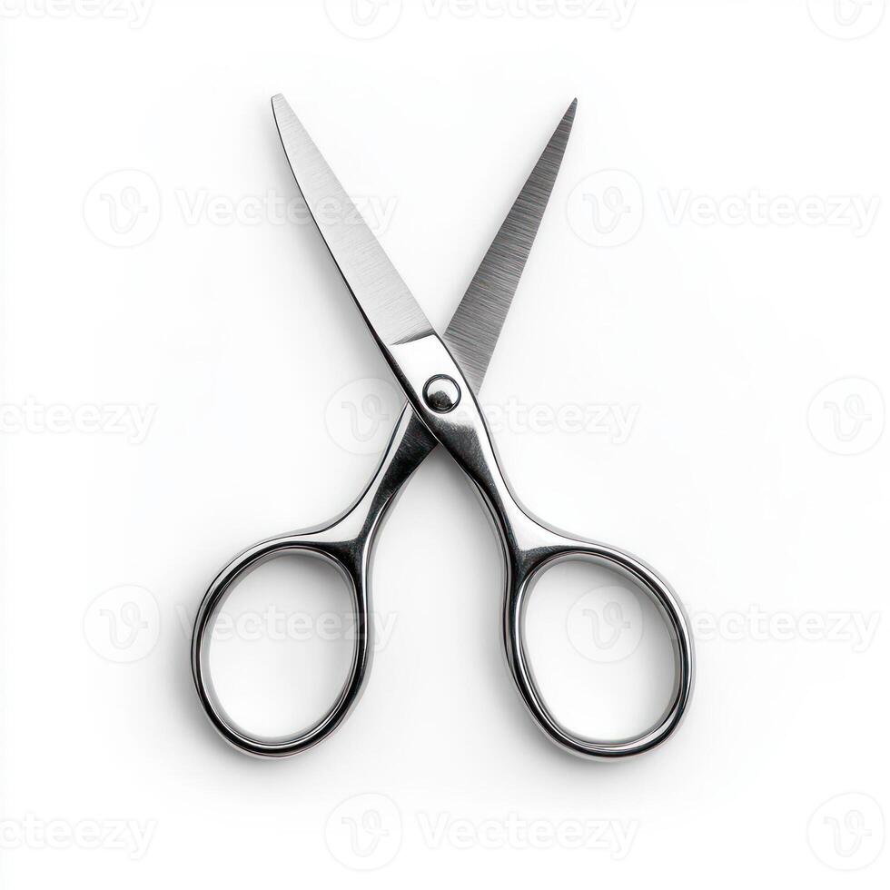 A pair of sharp stainless steel scissors on a white background. isolated on white background. photo