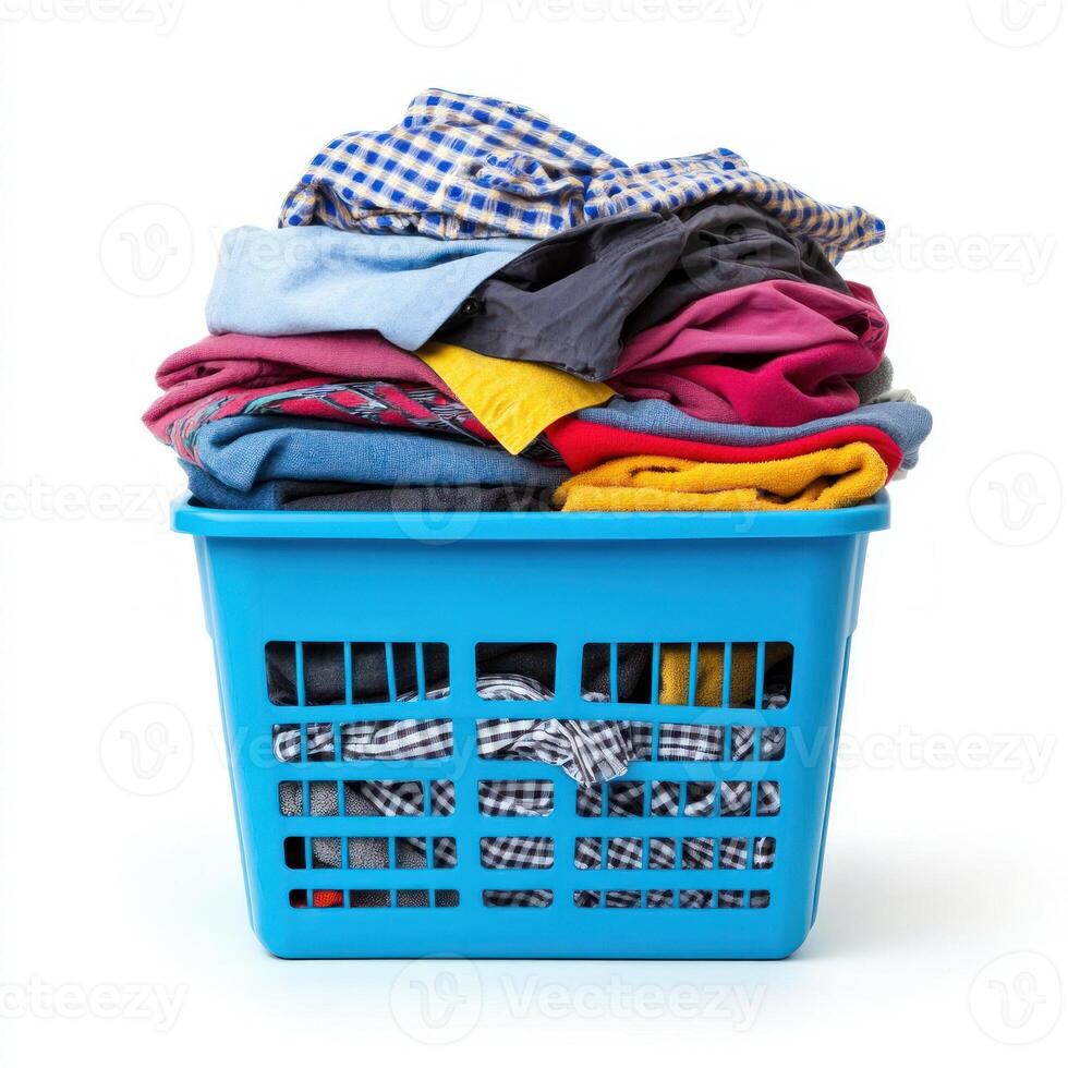 Colorful basket filled with clean, folded clothes for laundry. isolated on white background. photo