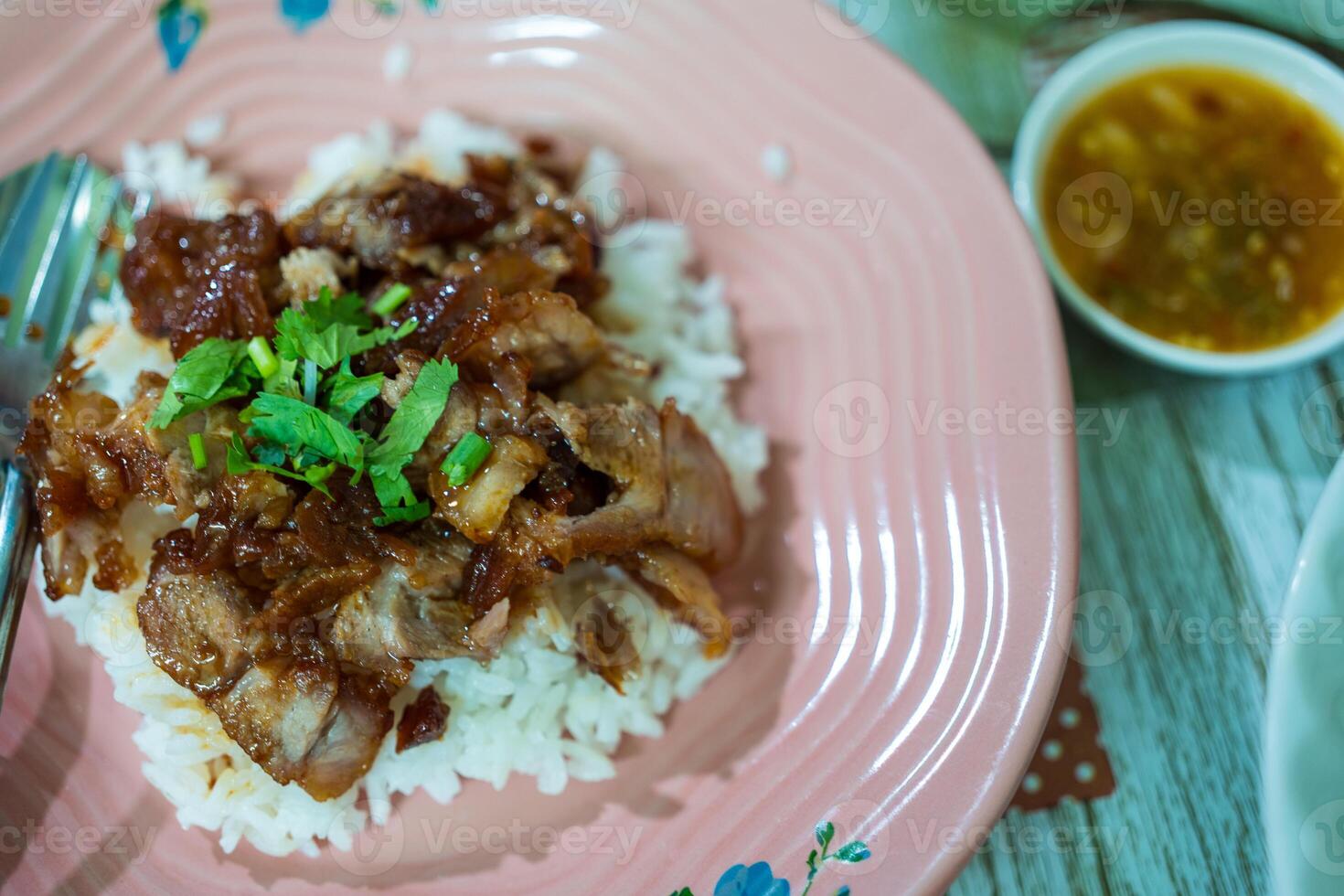 Barbecue red pork on rice photo
