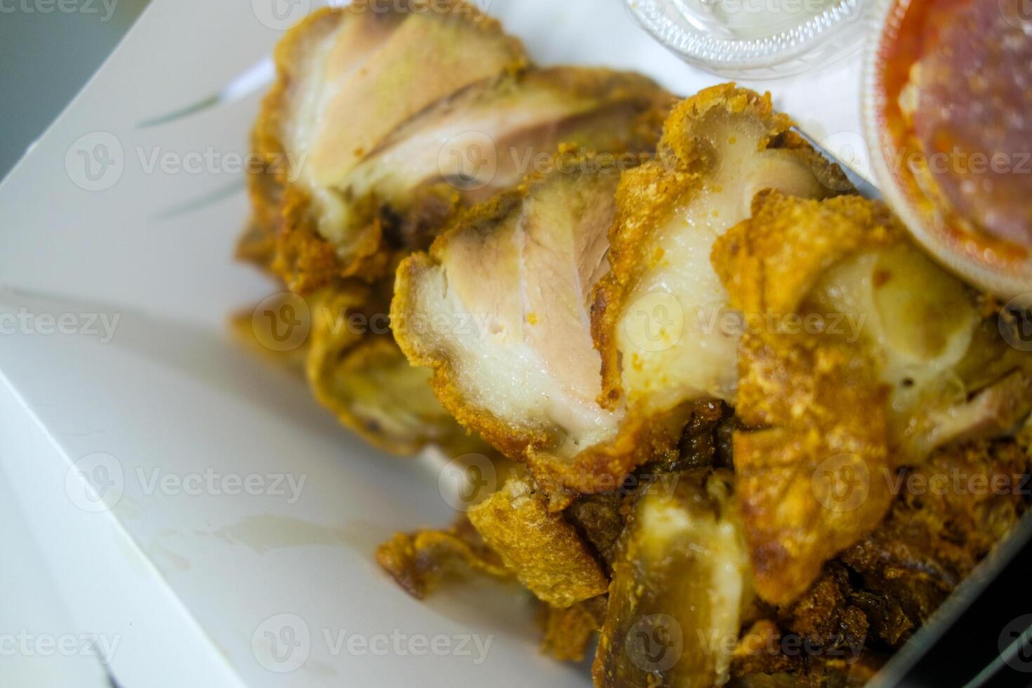 Crispy fried pork legs. Crispy pork cut into bite-sized pieces. photo