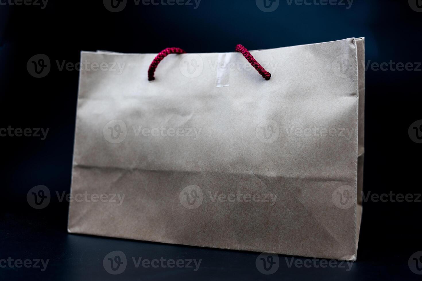 A brown paper shopping bag photo