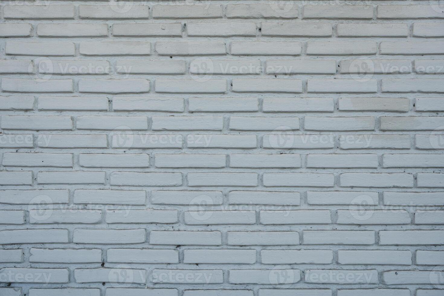 Painted white brick wall background pattern design photo