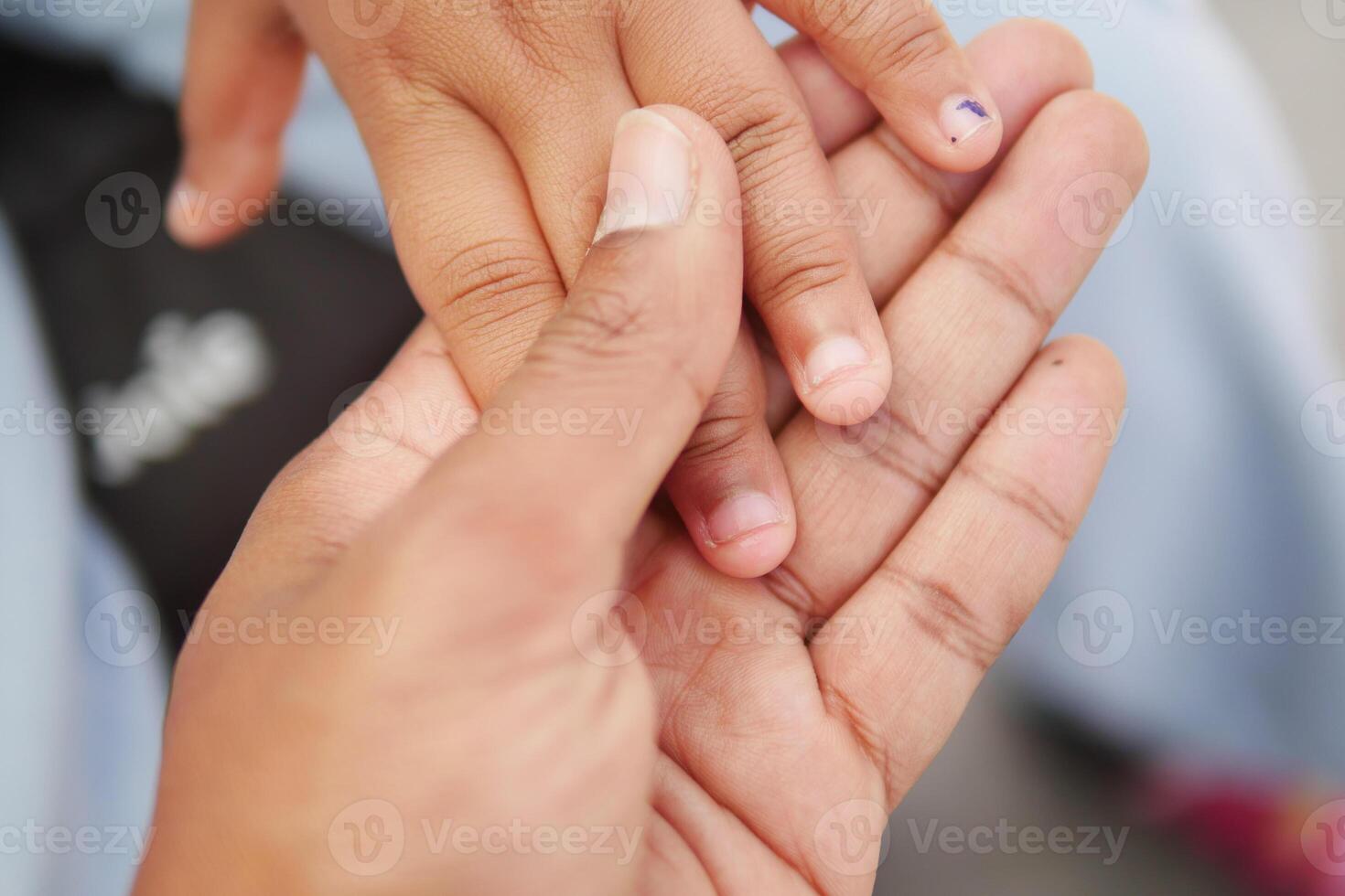 father holding hand of baby child, photo