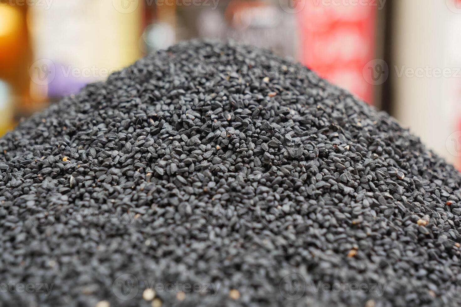 Close-Up of Black Sesame Seeds in a Market Display photo