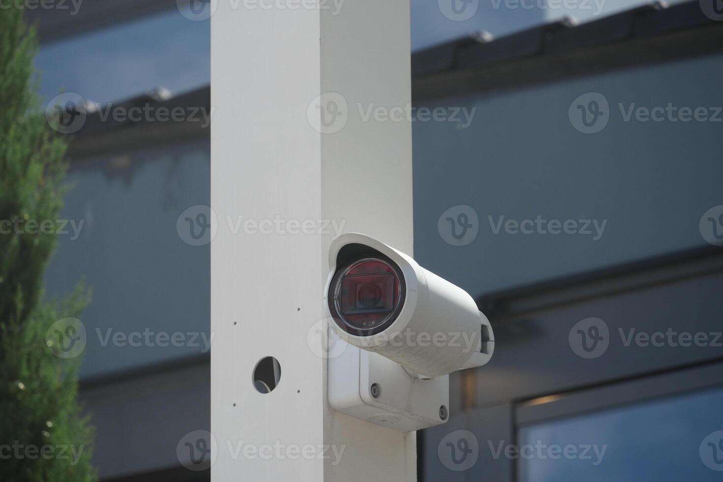 Security Camera Successfully Mounted on the Wall for Optimal Surveillance Purpose and Use photo