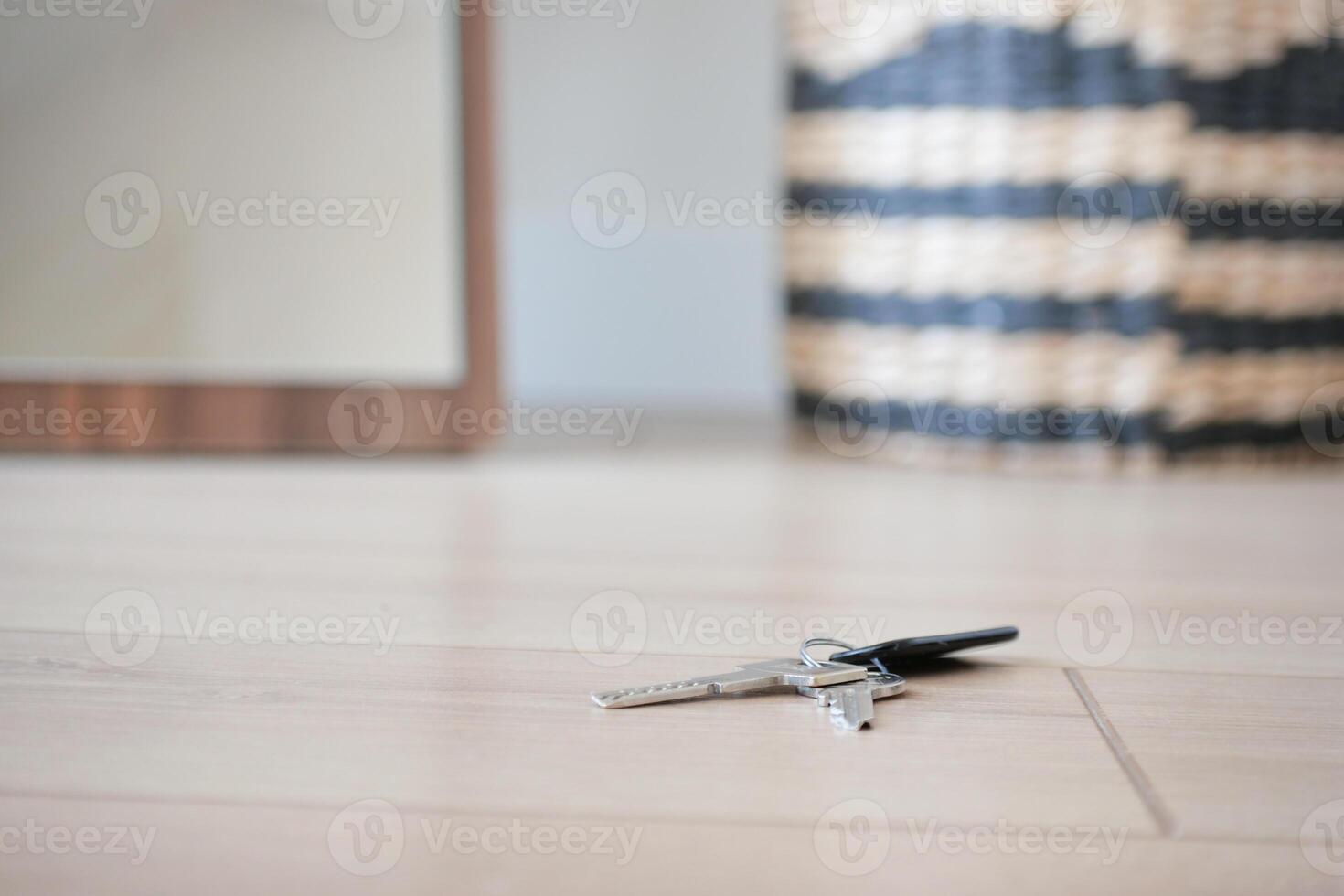 house keys on the ring on table in a room. To forget keys at home concept , photo