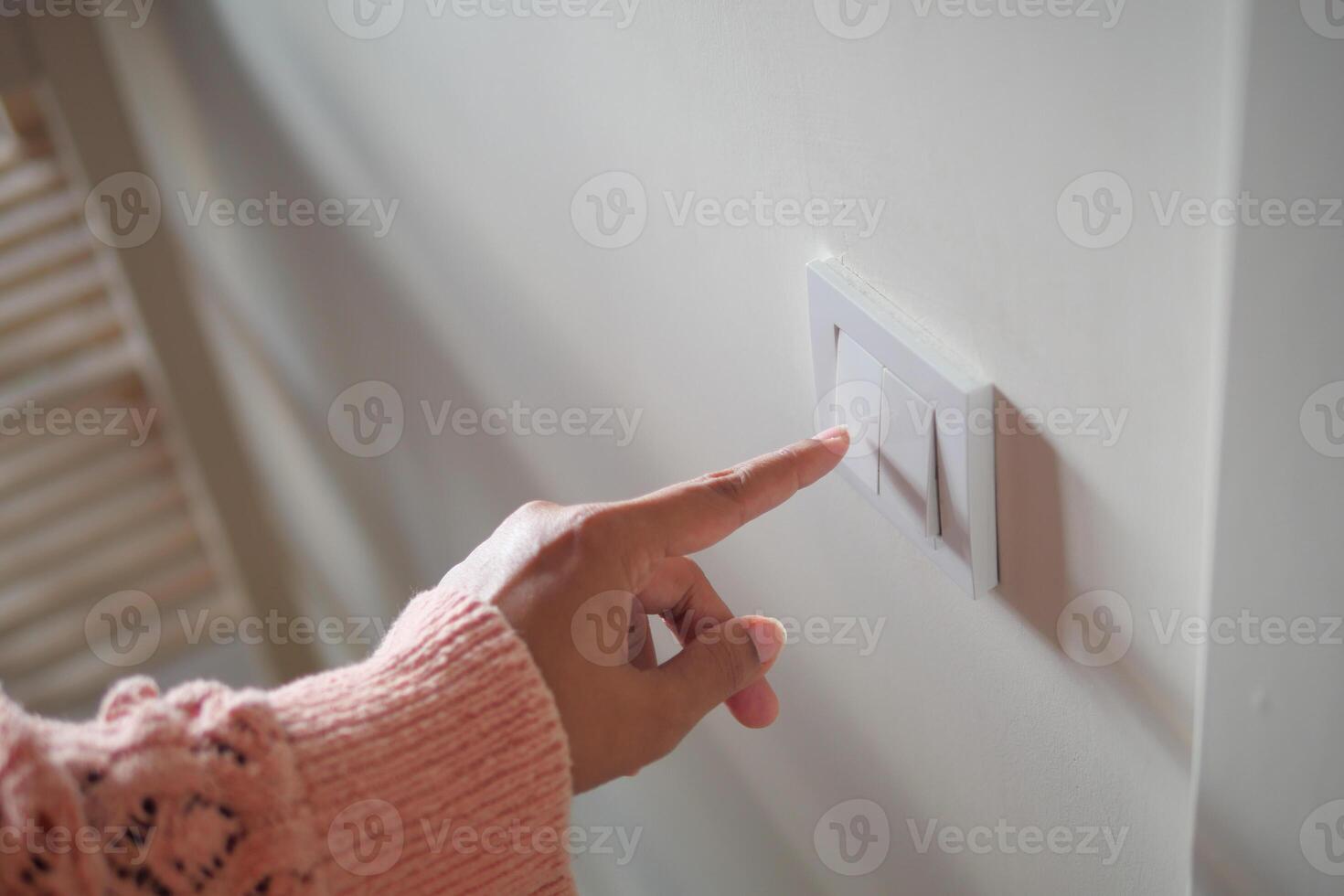 Turning On a Light Switch A Small Yet Significant Moment in Home Interior Design and Lifestyle photo