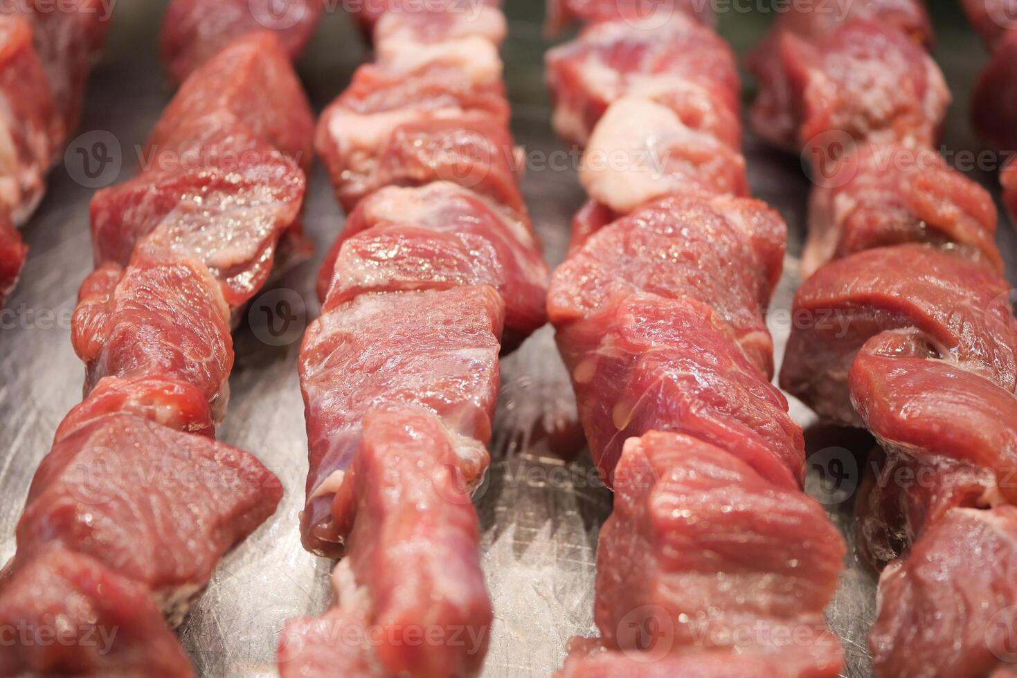 Fresh and Juicy Raw Meat Cubes Prepared Perfectly for Skewering and Grilling Delights photo