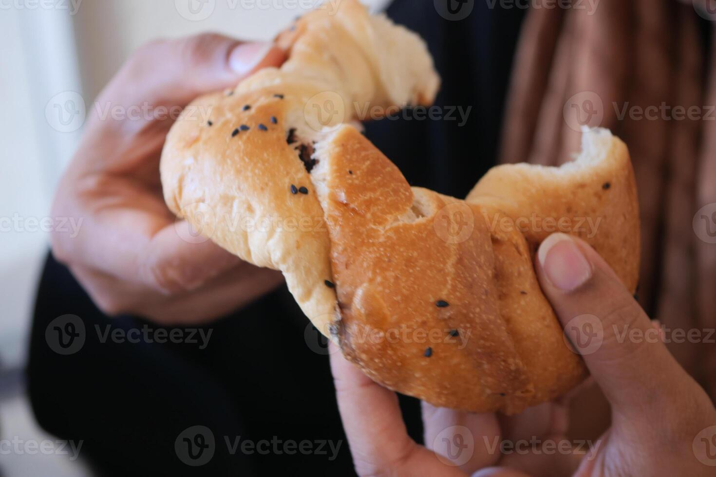 Enjoy Deliciously Freshly Baked Bread with Flavorful Nutty Black Seeds at Your Breakfast Table photo