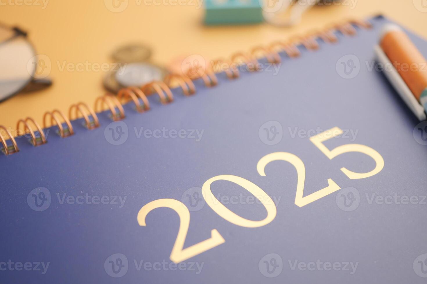 2025 year calendar on office desk photo