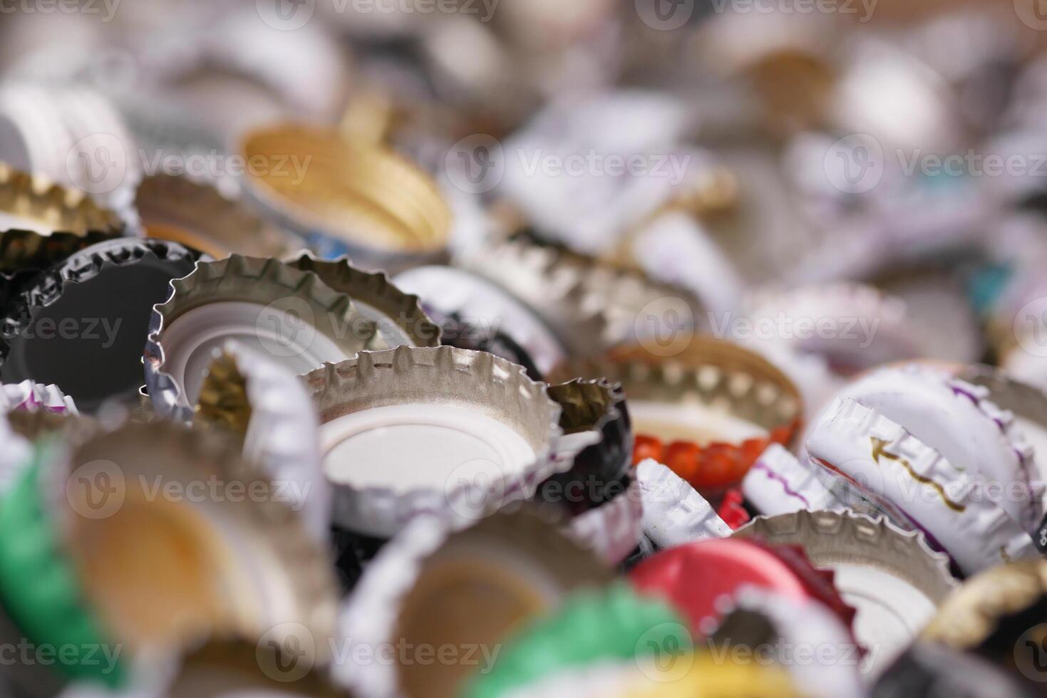 Close-Up of Colorful Bottle Caps in a Random Arrangement photo
