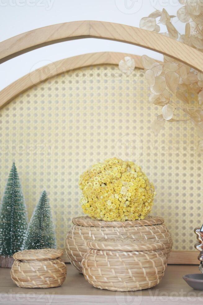 Discover stylish home decor with woven baskets and vibrant yellow flowers for a lovely touch photo