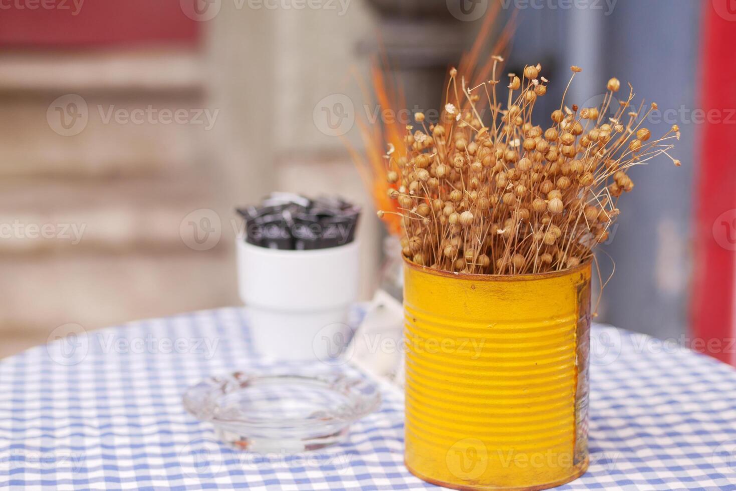Charming Caf Table Decor with Dried Flowers and Decorative Pots photo