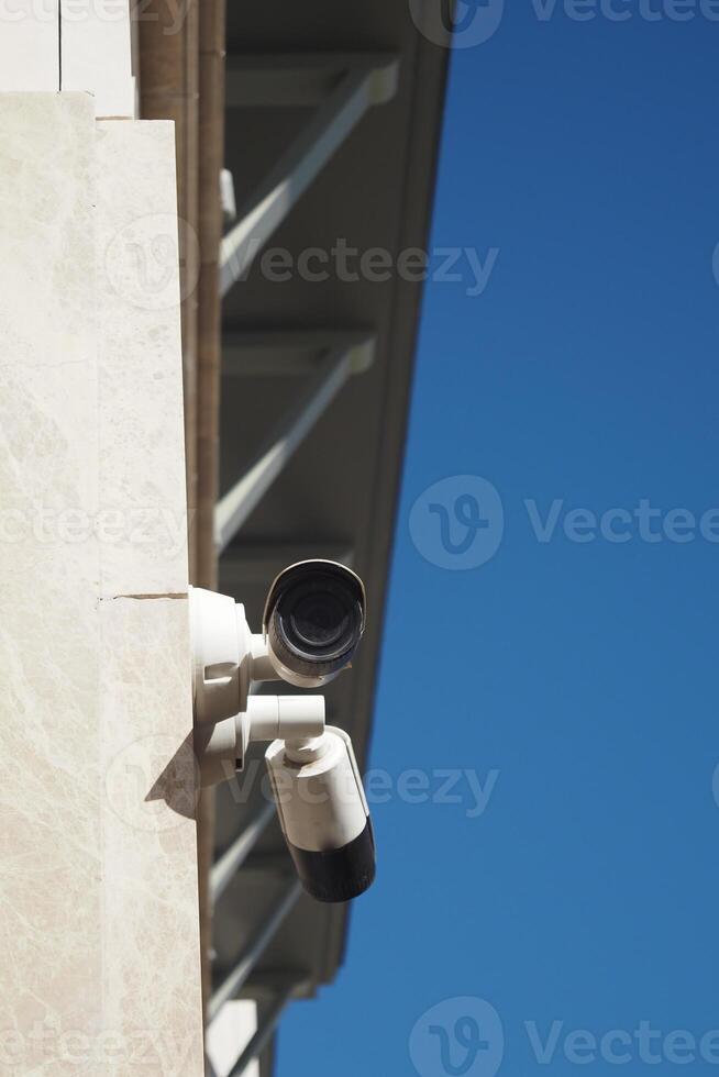 Security Camera Successfully Mounted on the Wall for Optimal Surveillance Purpose and Use photo