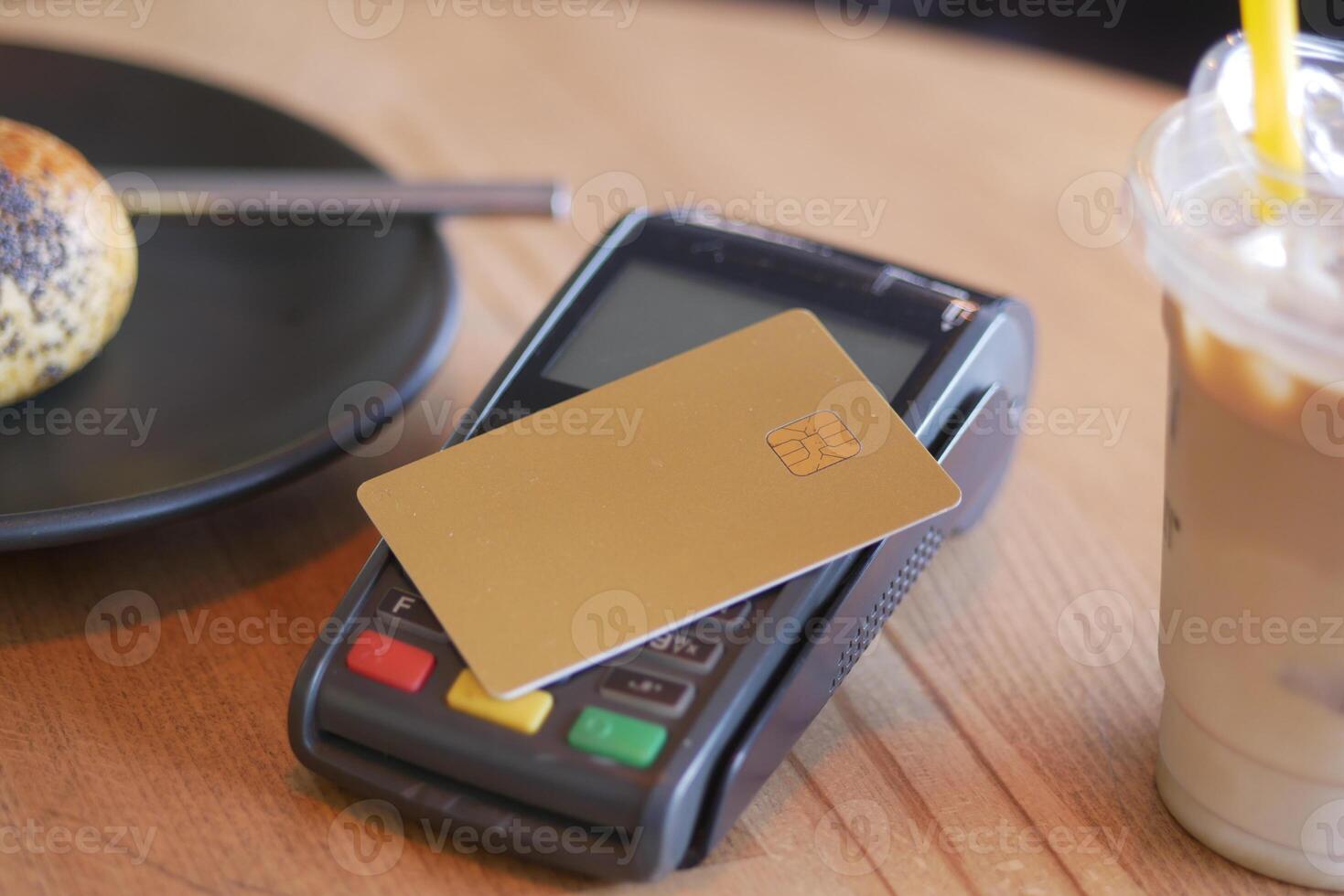 contactless payment concept with young man paying with credit card photo
