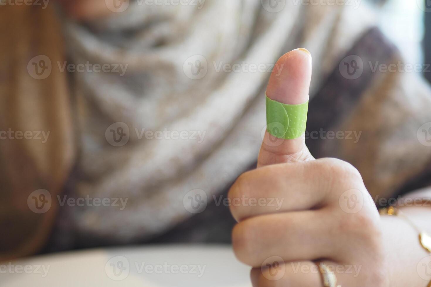 adhesive bandage on hand close up photo