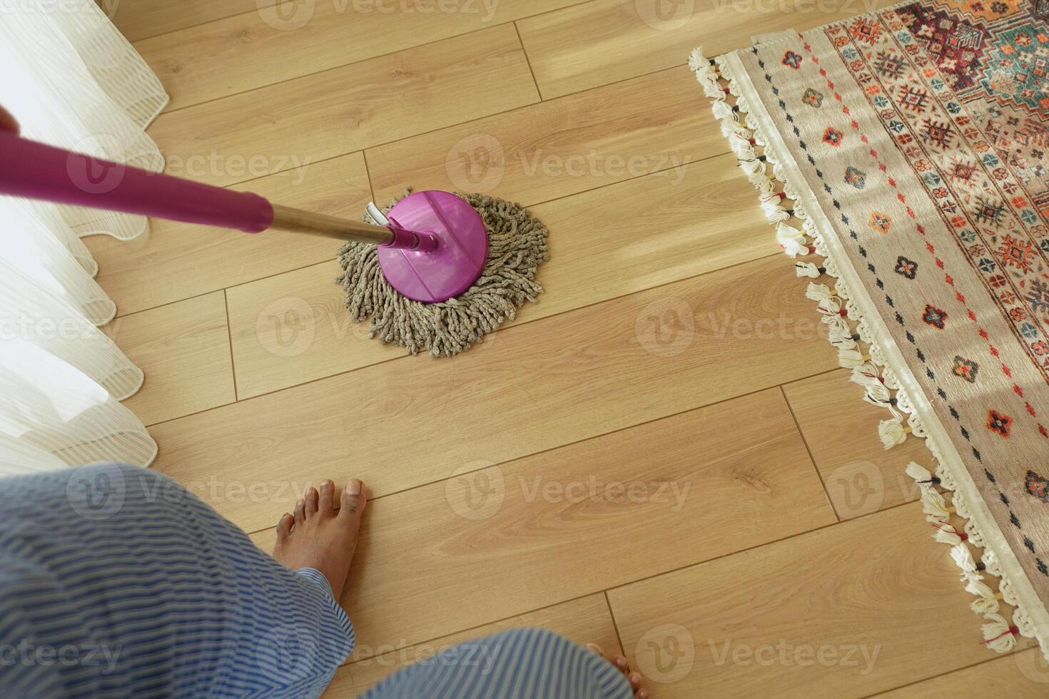 Achieve Efficient Floor Cleaning with a Mop on Your Wooden Surface for Optimal Results photo