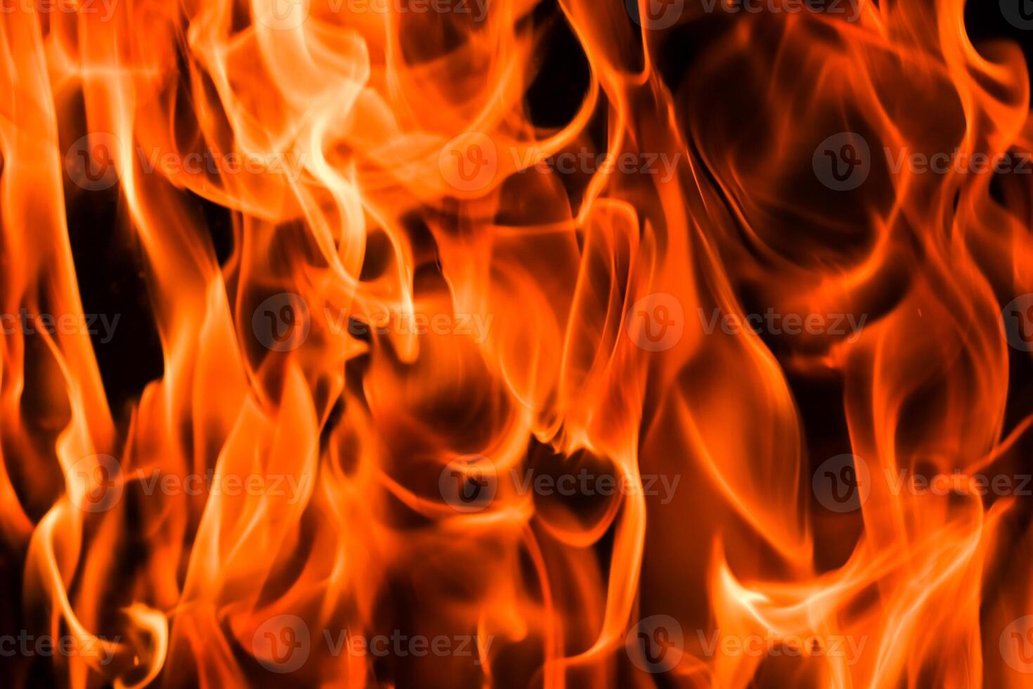 Flames of fire on a black background. The mystery of fire. photo