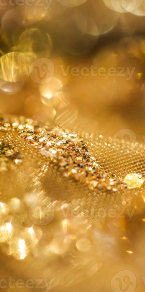 Golden abstract blur defocused background. Concept for New Years Eve, Christmas and happy holidays photo