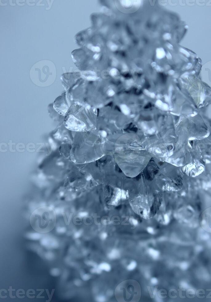 Patterned Clear Crystal With Soft Blue Backlight Closeup View Vertical Stock Photo