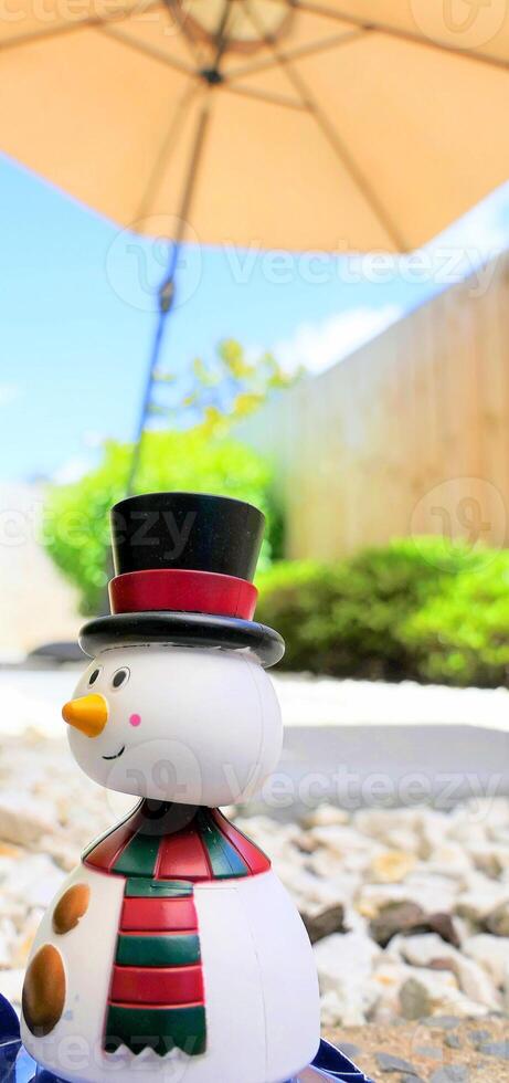 Shot of snow man having a summer Christmas holiday photo