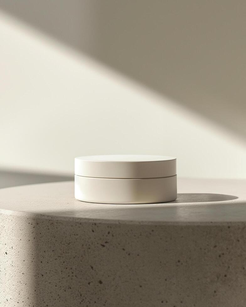 A white cosmetic plastic jar with lid on a soft shadow beige background mockup photo