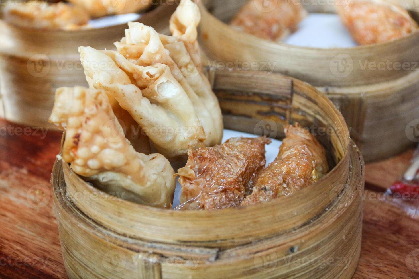 Gacoan noodles are a popular food in Indonesia. Made from noodles served with spicy spices and fried dumplings. photo