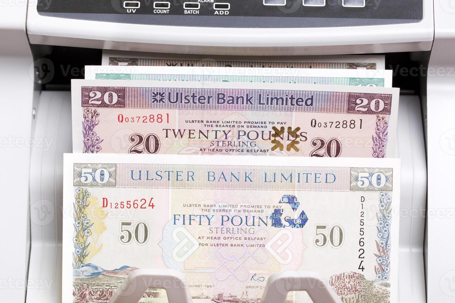 Irish pound in the counting machine photo