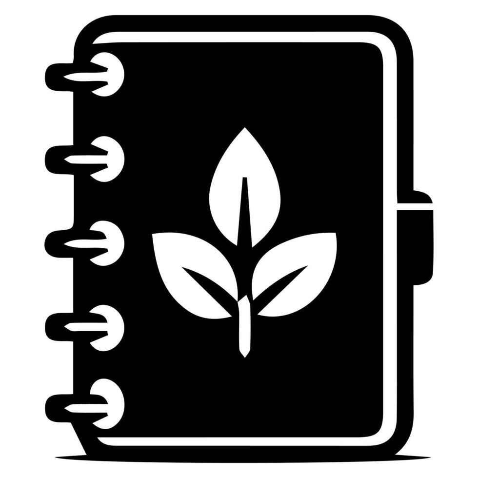 A notebook with a leaf on it vector