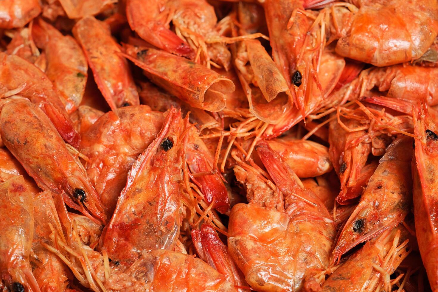 a pile of cooked shrimp is shown in this photo