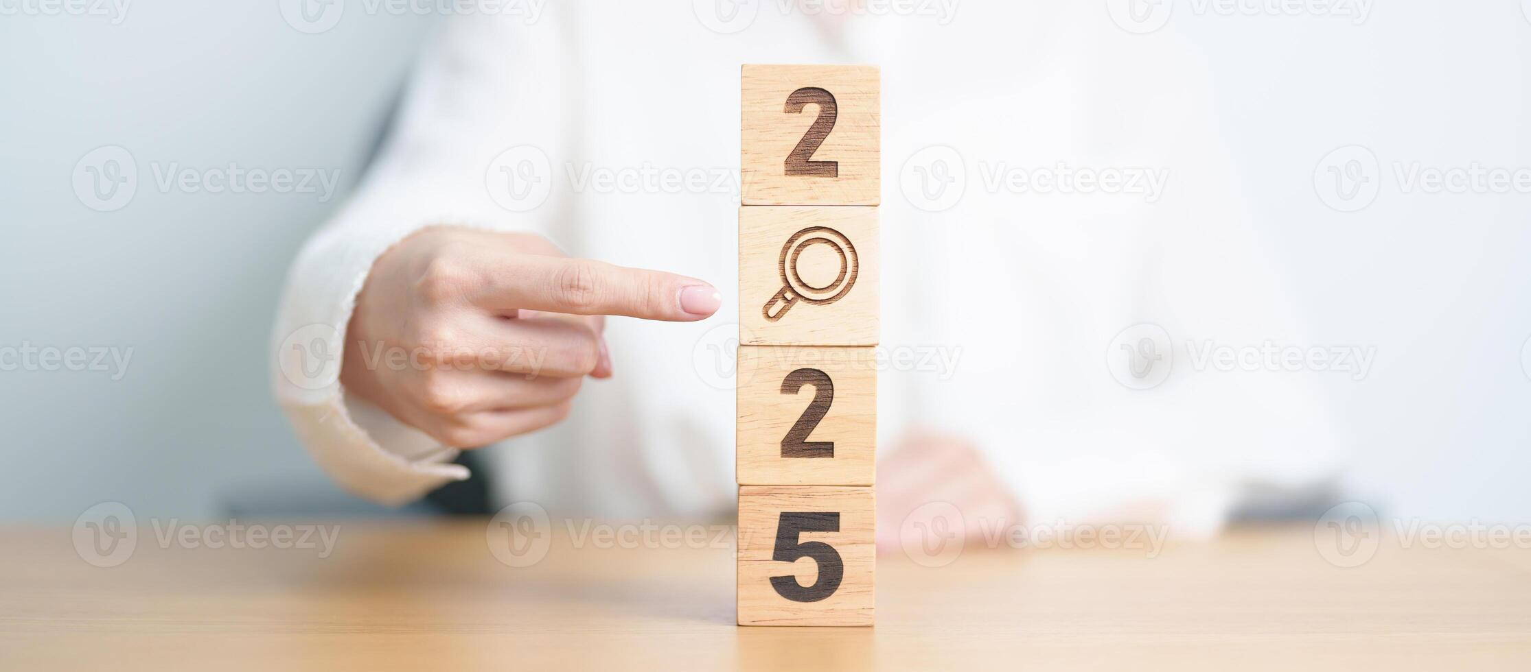 2025 block with magnifying glass icon. SEO, Search Engine Optimization, hiring , Advertising, Idea, Strategy, marketing, Keyword, Content and New Year start concepts photo