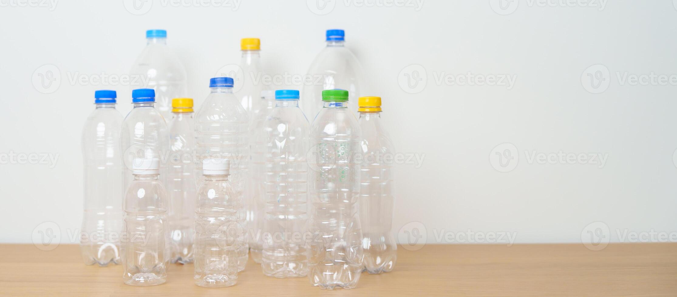 Plastic bottle on table at home or office. Recycle garbage Sorting. Plastic Free, Ecology, Environmental, pollution, Dispose recycling, waste management and trash Separation concept photo