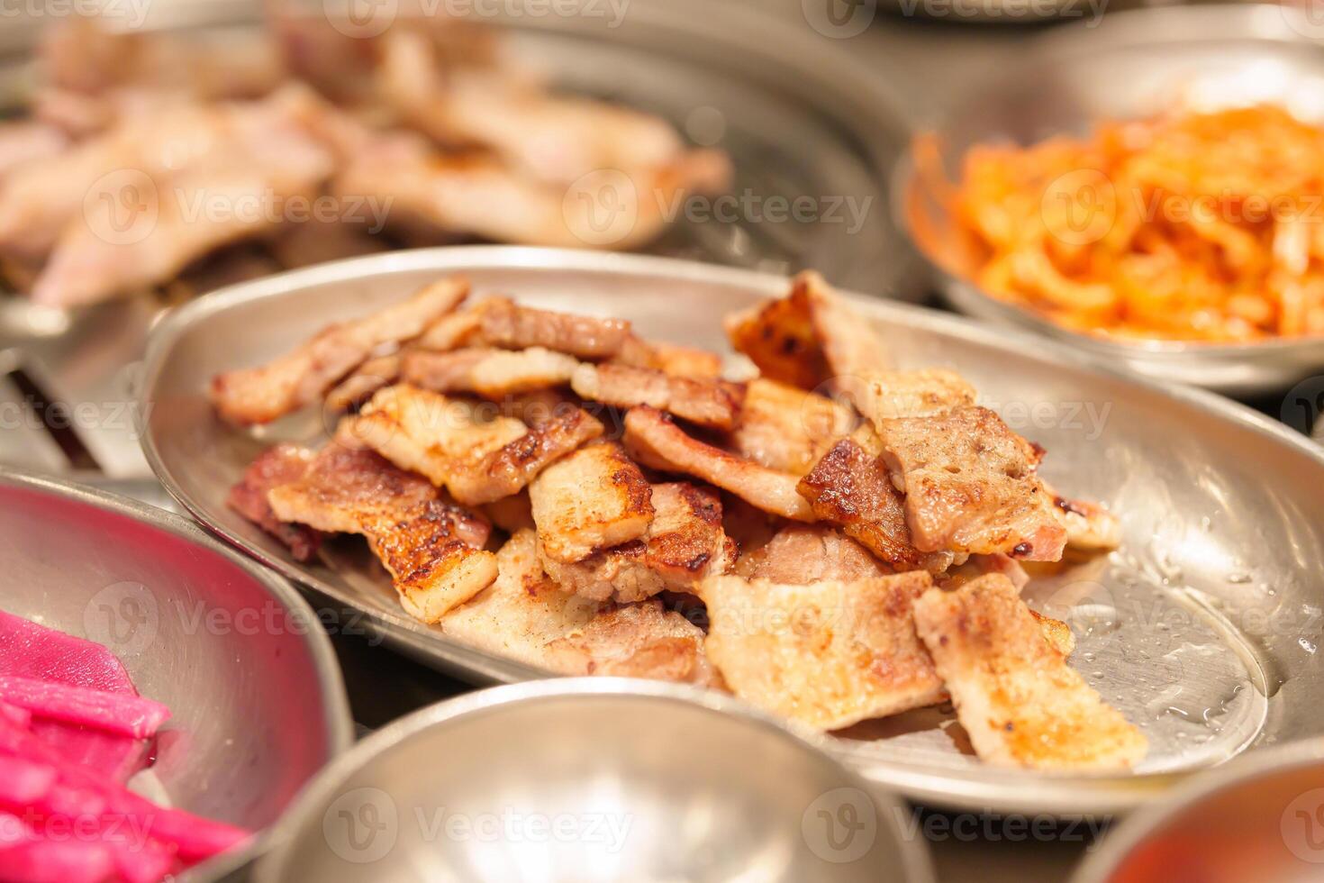meat pork grilled on stove serve in restaurant. Korean food and BBQ traditional style photo