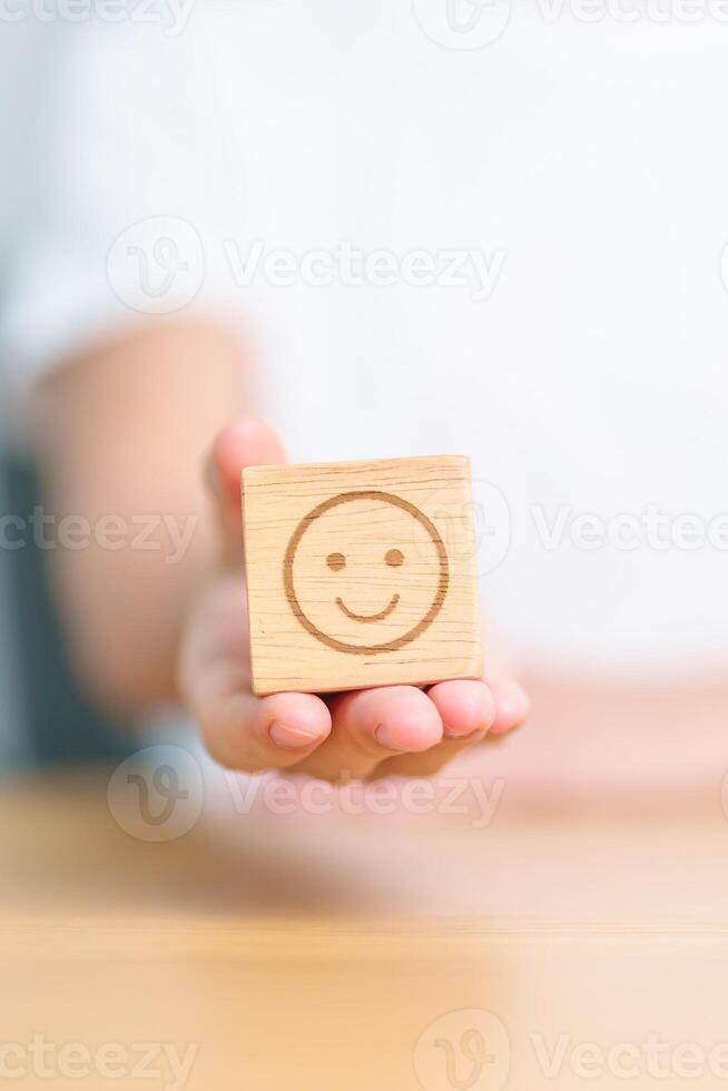 Woman show Happy Smile face block, Mental health Assessment, Psychology, Health Wellness, Feedback, Customer Review, Experience, Satisfaction Survey, Positive Thinking and World Mental Health day photo