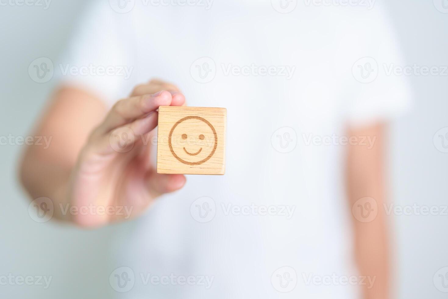 Woman show Happy Smile face block, Mental health Assessment, Psychology, Health Wellness, Feedback, Customer Review, Experience, Satisfaction Survey, Positive Thinking and World Mental Health day photo
