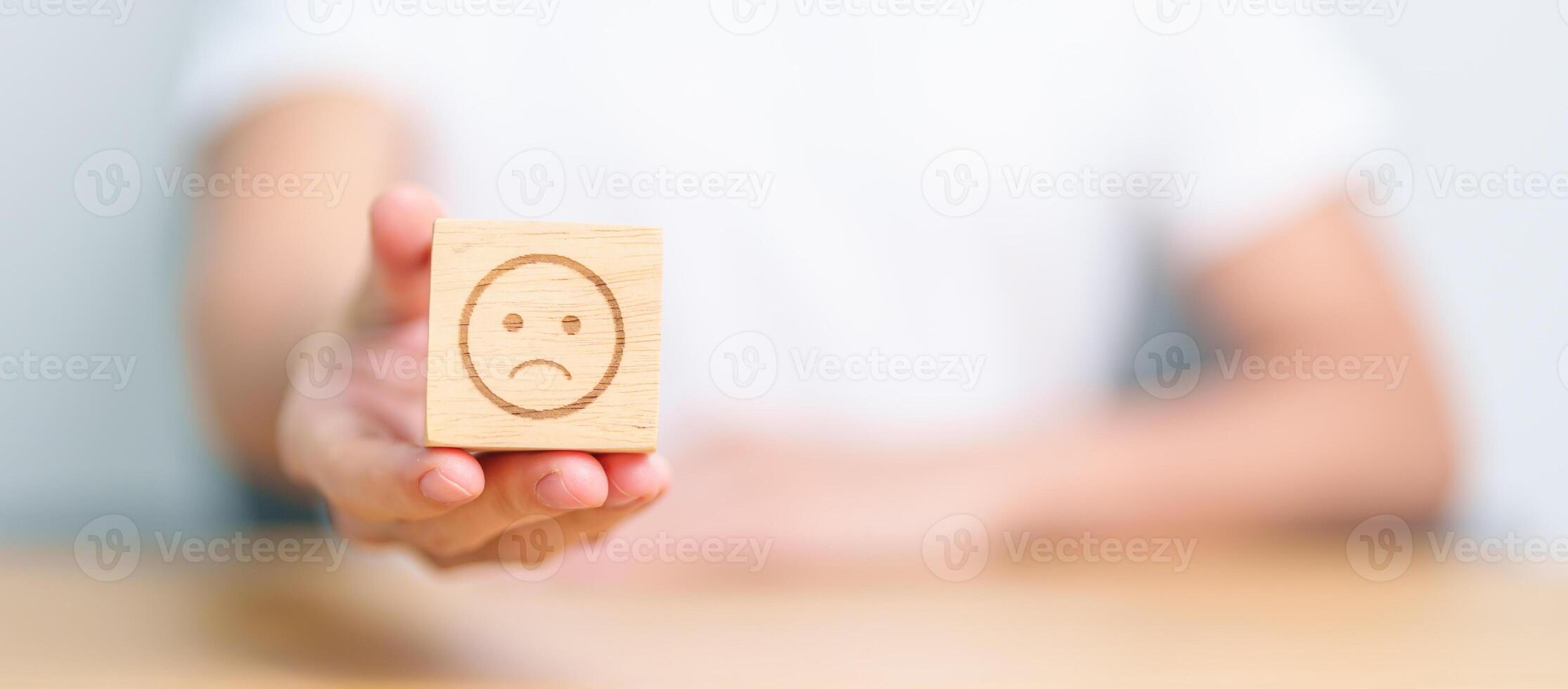 Woman show Unhappy Sad face block, Mental health Assessment, Psychology, Health Wellness, Feedback, Customer Review, Experience, Satisfaction Survey, Negative Thinking and World Mental Health day photo