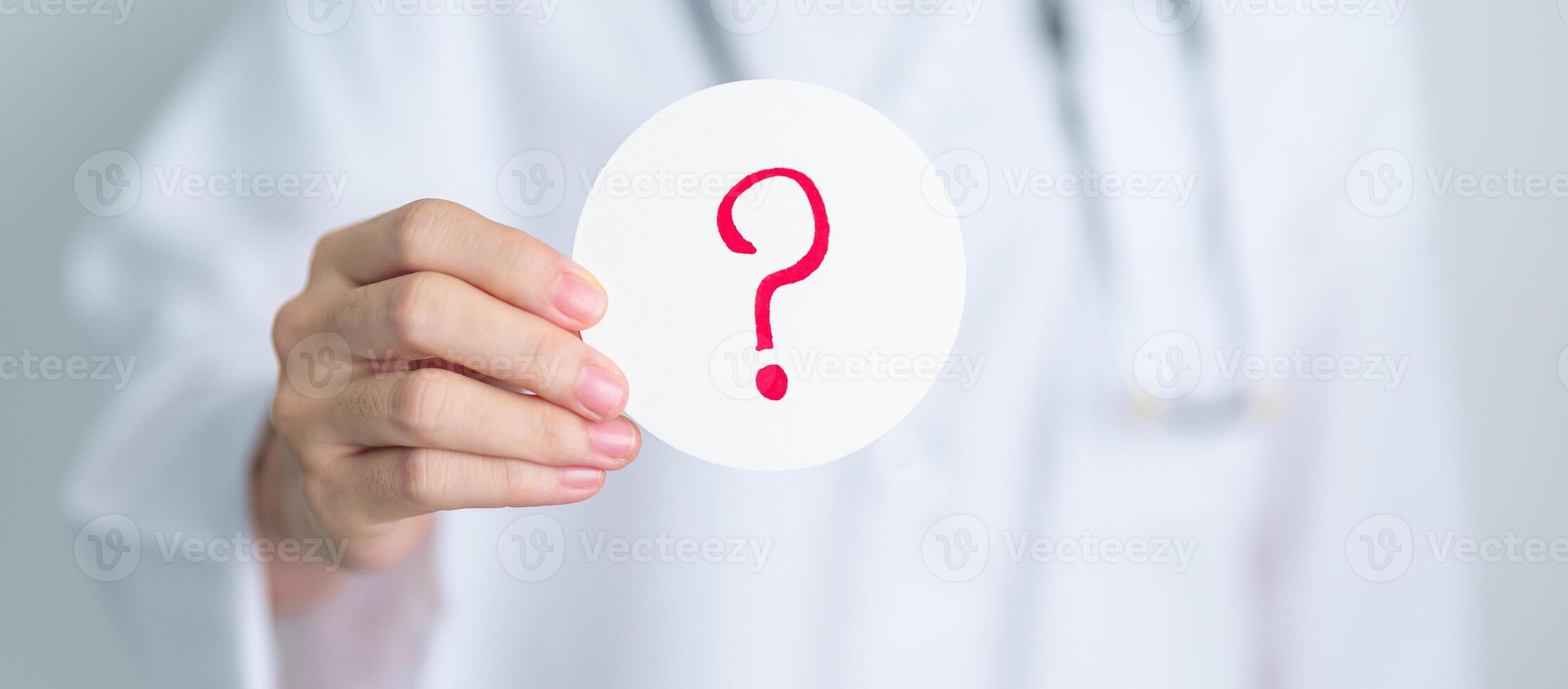 Doctor show Questions Mark on paper. FAQ, frequency asked questions, Answer, Information, Communication, Health, Diagnosis and Medical concept photo