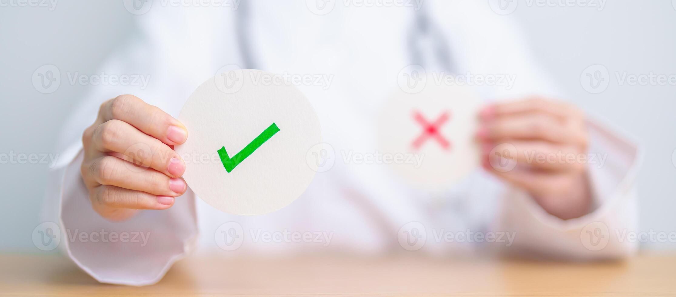 Doctor show Right symbol paper. True and false, accept and rejected, evaluation, Diagnosis, Vote, Poll, Yes or No, Health, Medical and Survey concepts photo