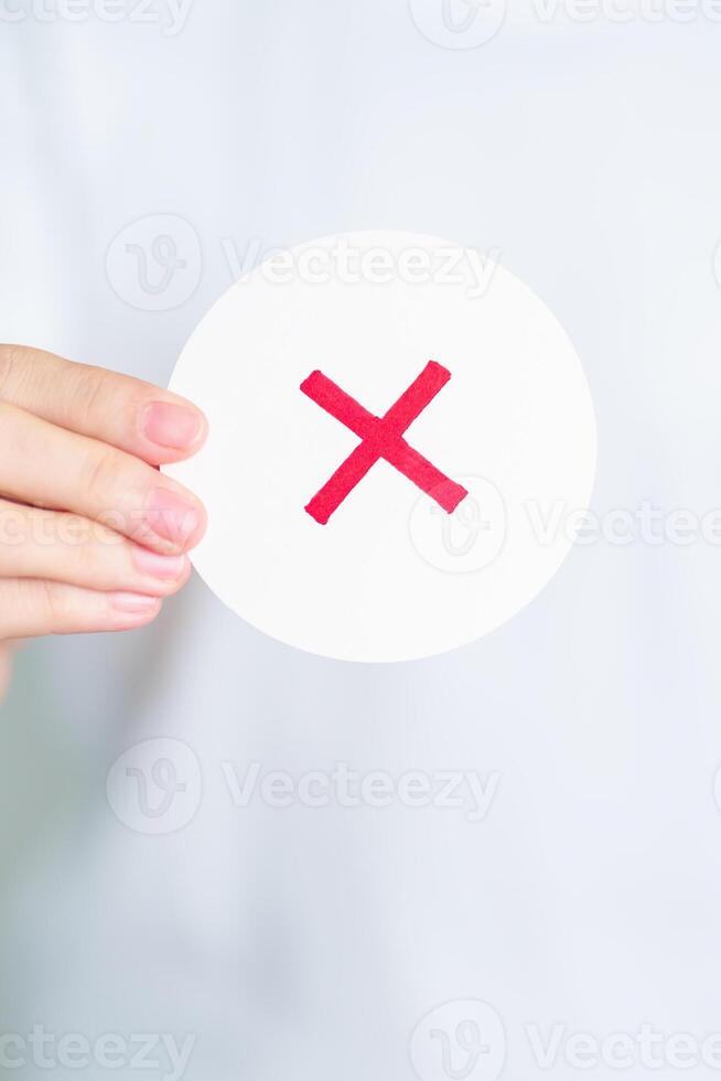 Woman show Wrong symbol paper. True and false, accept and rejected ...