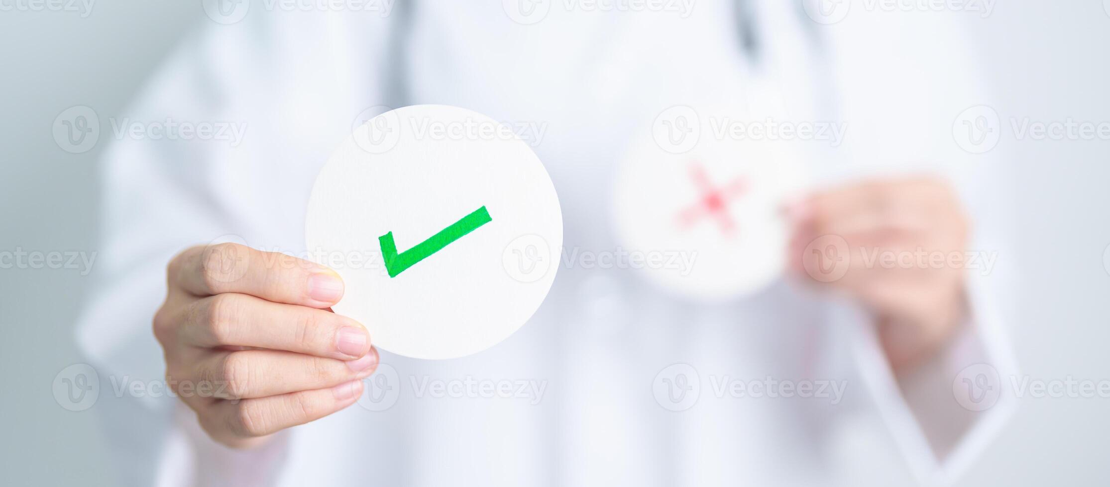 Doctor show Right symbol paper. True and false, accept and rejected, evaluation, Diagnosis, Vote, Poll, Yes or No, Health, Medical and Survey concepts photo