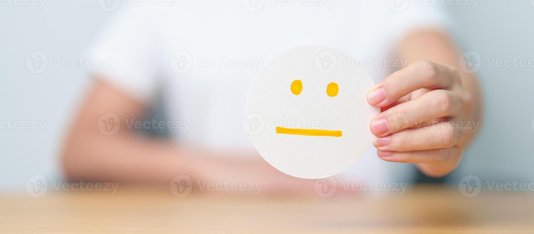 Woman show Emotion face paper, Mental health Assessment, Psychology, Health Wellness, Feedback, Customer Review, Experience, Satisfaction Survey, Positive Thinking and World Mental Health day photo