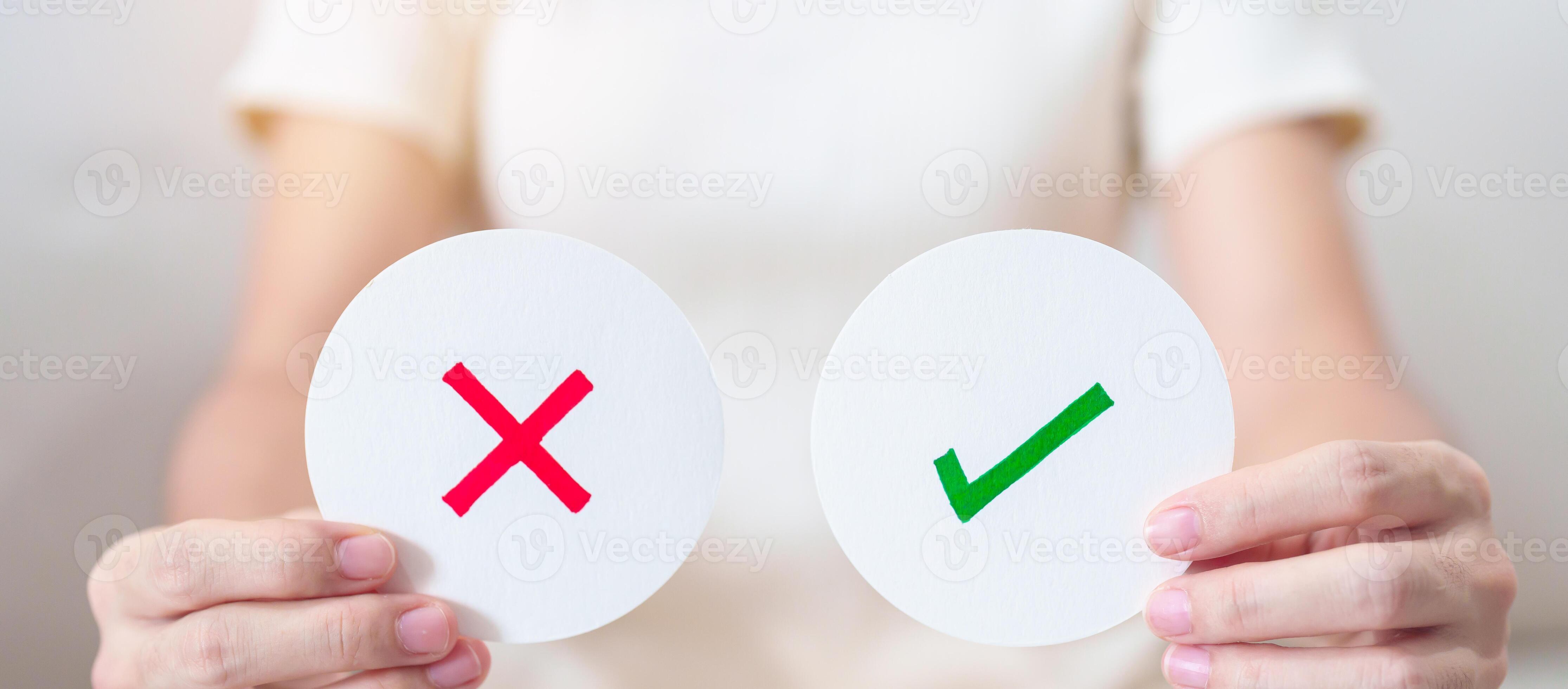Woman show Wrong and Right symbol paper. True and false, accept and ...