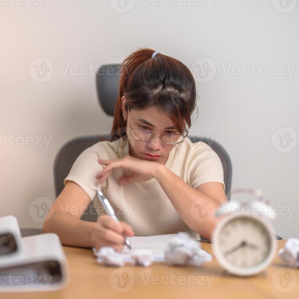 stressed Woman with mistake paper and clock, Tired female businesswoman working overload at office, Exhausted woman with document folder stack at late night in home. Failure, Problem and business photo