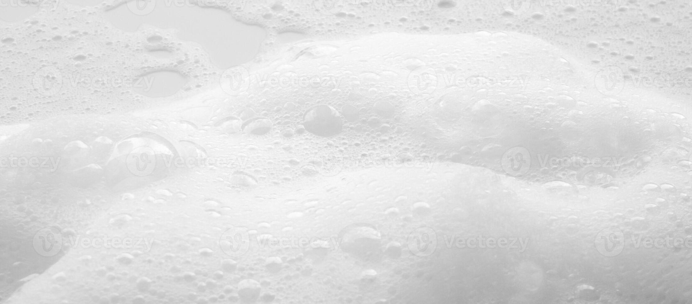 Abstract white soap foam bubbles texture background photo